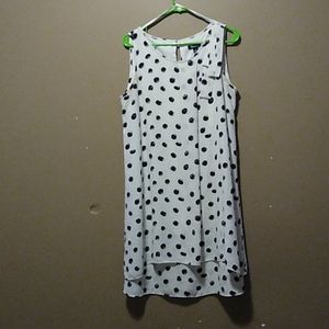 White dress with black pock a dots.